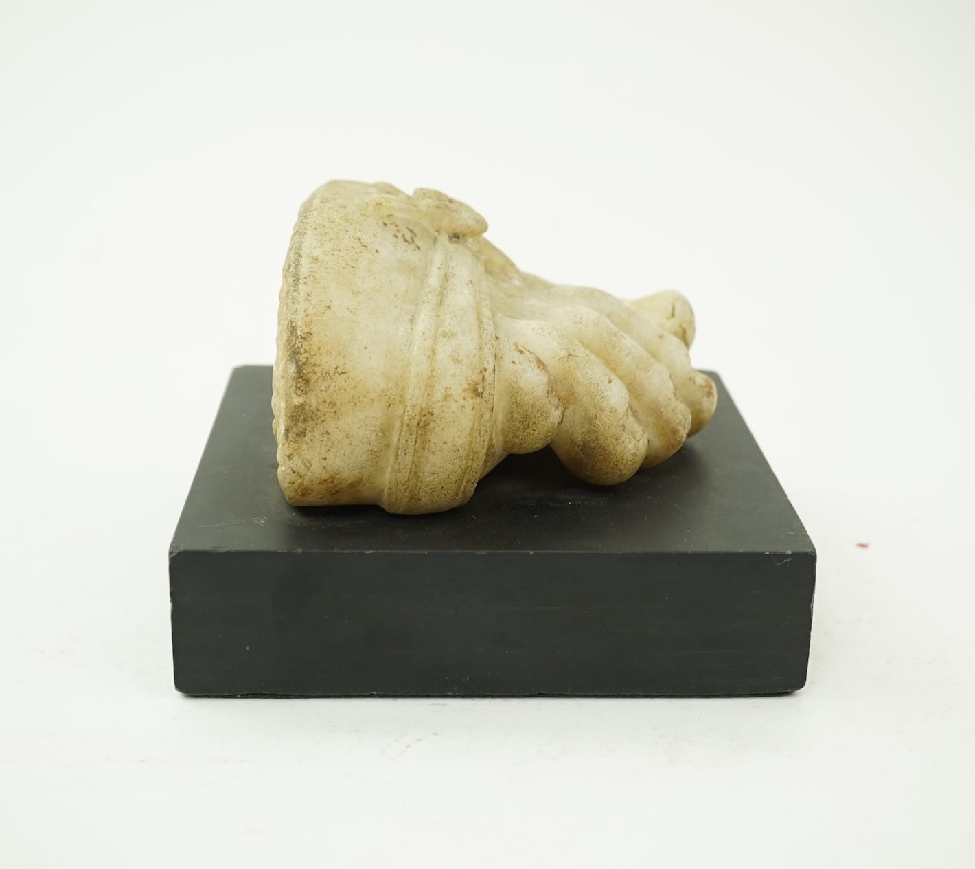 A Roman marble foot fragment, probably 2nd century AD